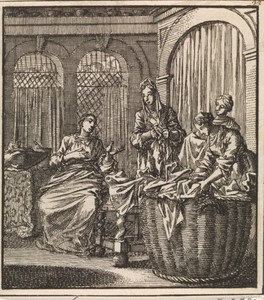 Vier vrouwen bij een wasmand