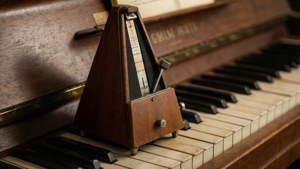 Vintage Metronome on Piano