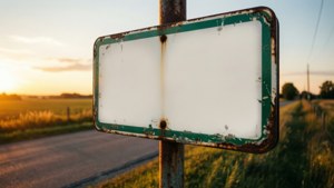 Vintage Road Sign at Sunset