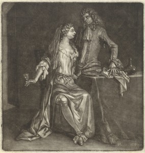 Vrouw en een man bij een tafel