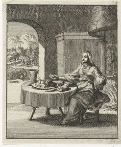 Vrouw etend aan een tafel