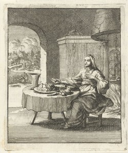 Vrouw etend aan een tafel