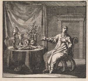 Vrouw wijst op de vanitassymbolen op de tafel voor haar