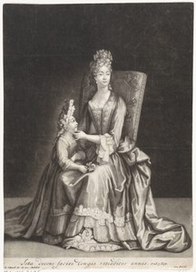 Vrouw zittend op een stoel met naast haar een jong meisje