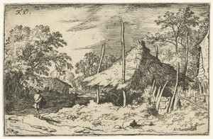 Wandelaar bij een hooiberg