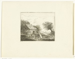Watermolen met brug over de rivier