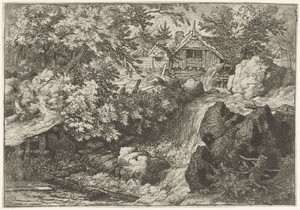 Watermolen nabij een waterval