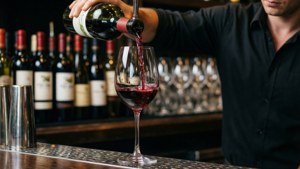 Wine Pouring at Bar