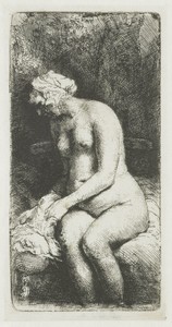 Woman bathing her feet at a brook