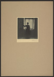 [Woman in front of window]