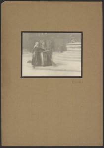 [Woman with broom on street]