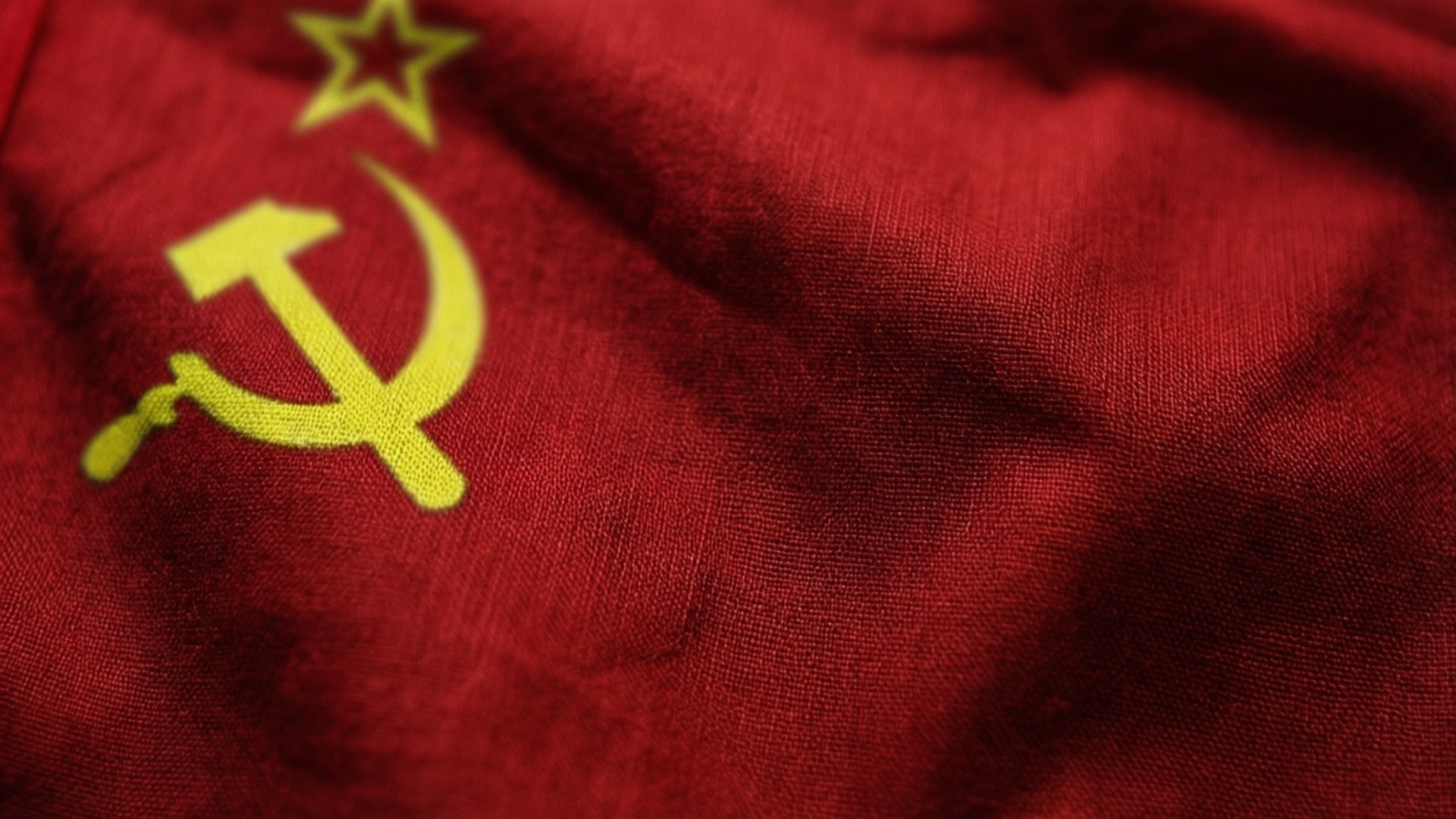 Wrinkled Soviet Flag Close-Up by Wallpapers.art Studio