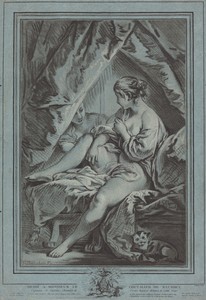 Young Woman Seated on a Bed