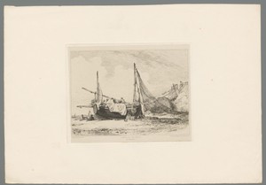 Zeilboot met vissersnet op het strand bij Brighton