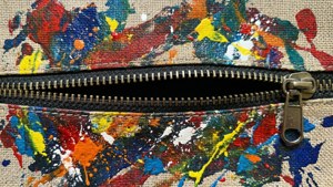 Zipper Through Paint Splatters